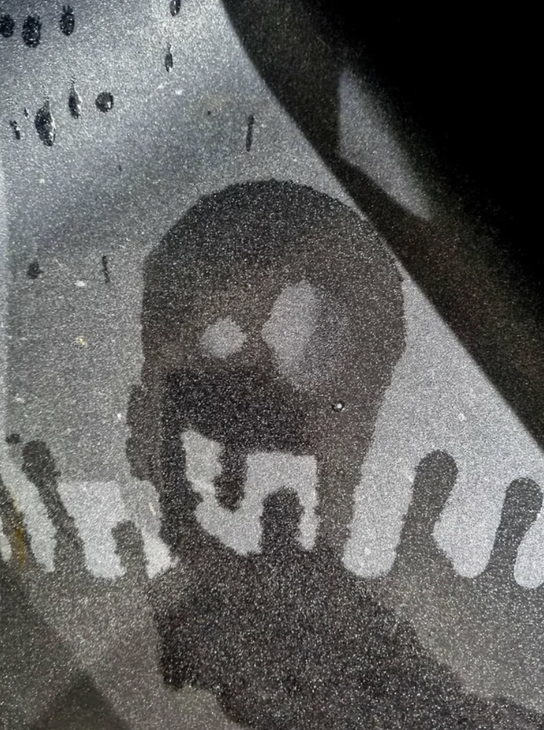 water in the shape of a face