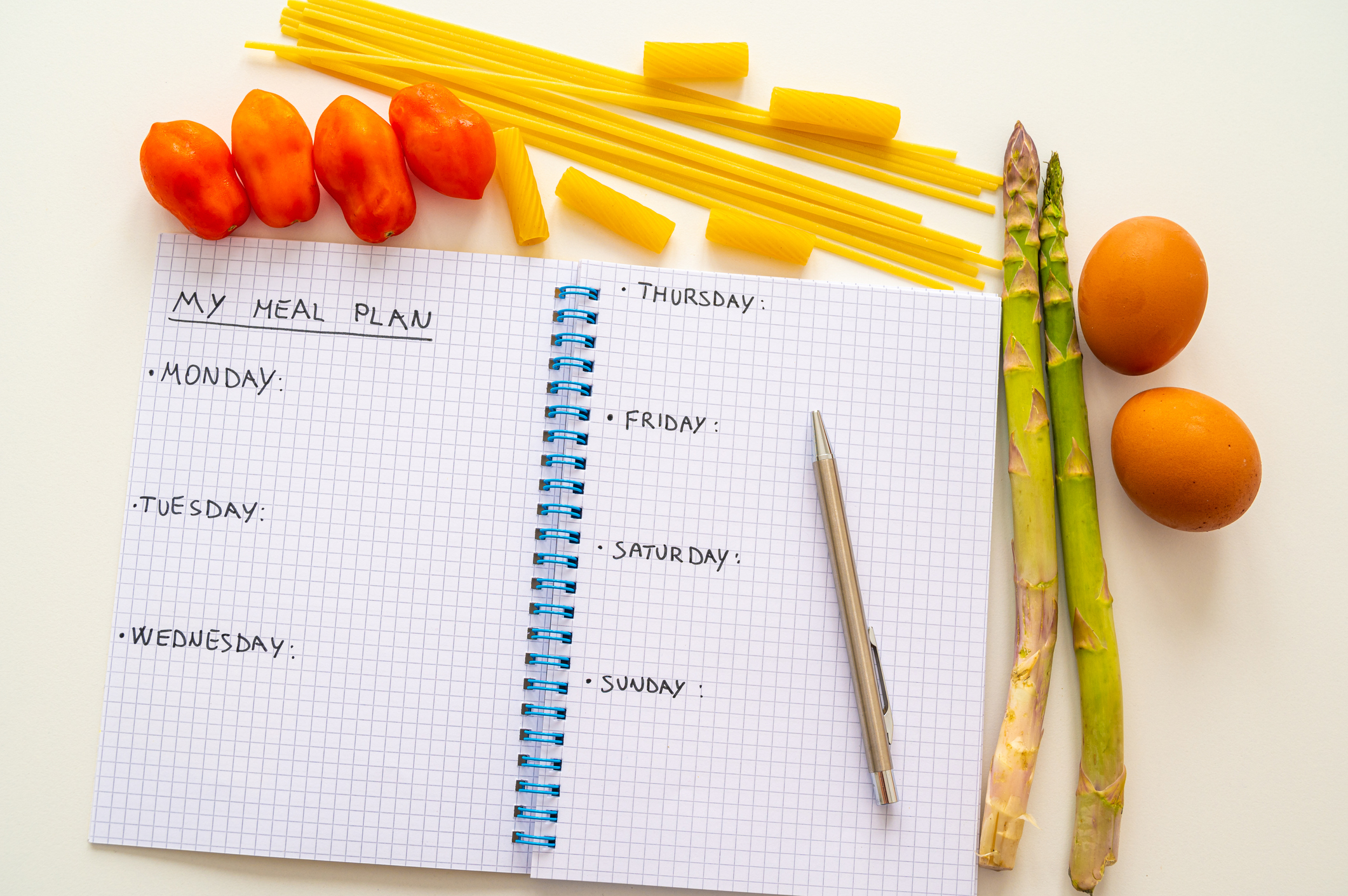 A &quot;Meal Plan&quot; with food surrounding the notebook
