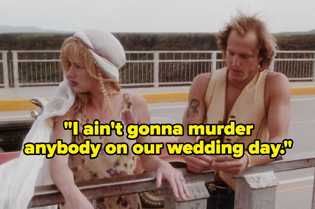 Natural Born Killers actors standing on the side of the road.