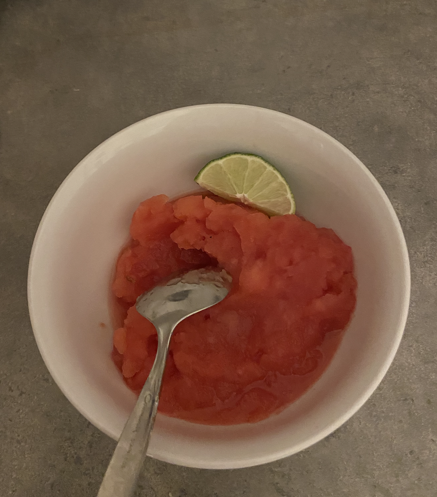 A bowl of watermelon sorbet with lime