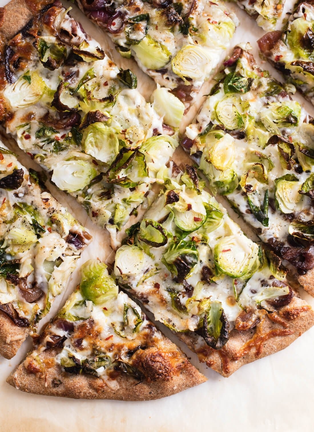 a sliced brussels sprout pizza