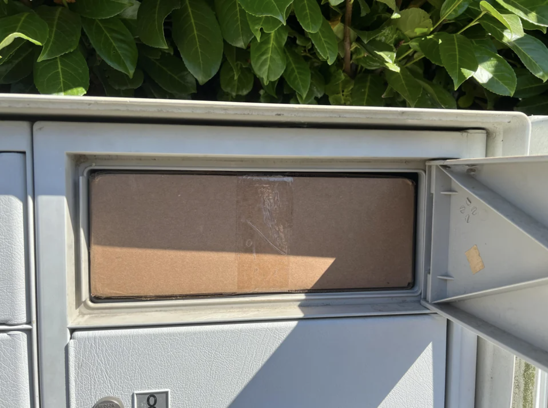 package can&#x27;t get out of the mailbox because there is nothing to grab nor room to reach in and get it