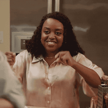 Quinta Brunson laughing and dancing