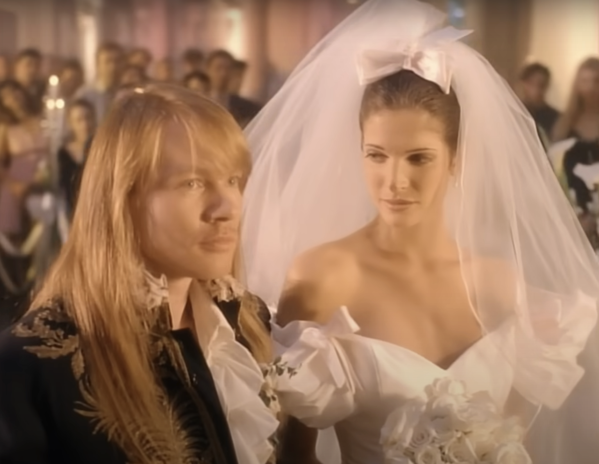 closeup of axl and stephanie getting married