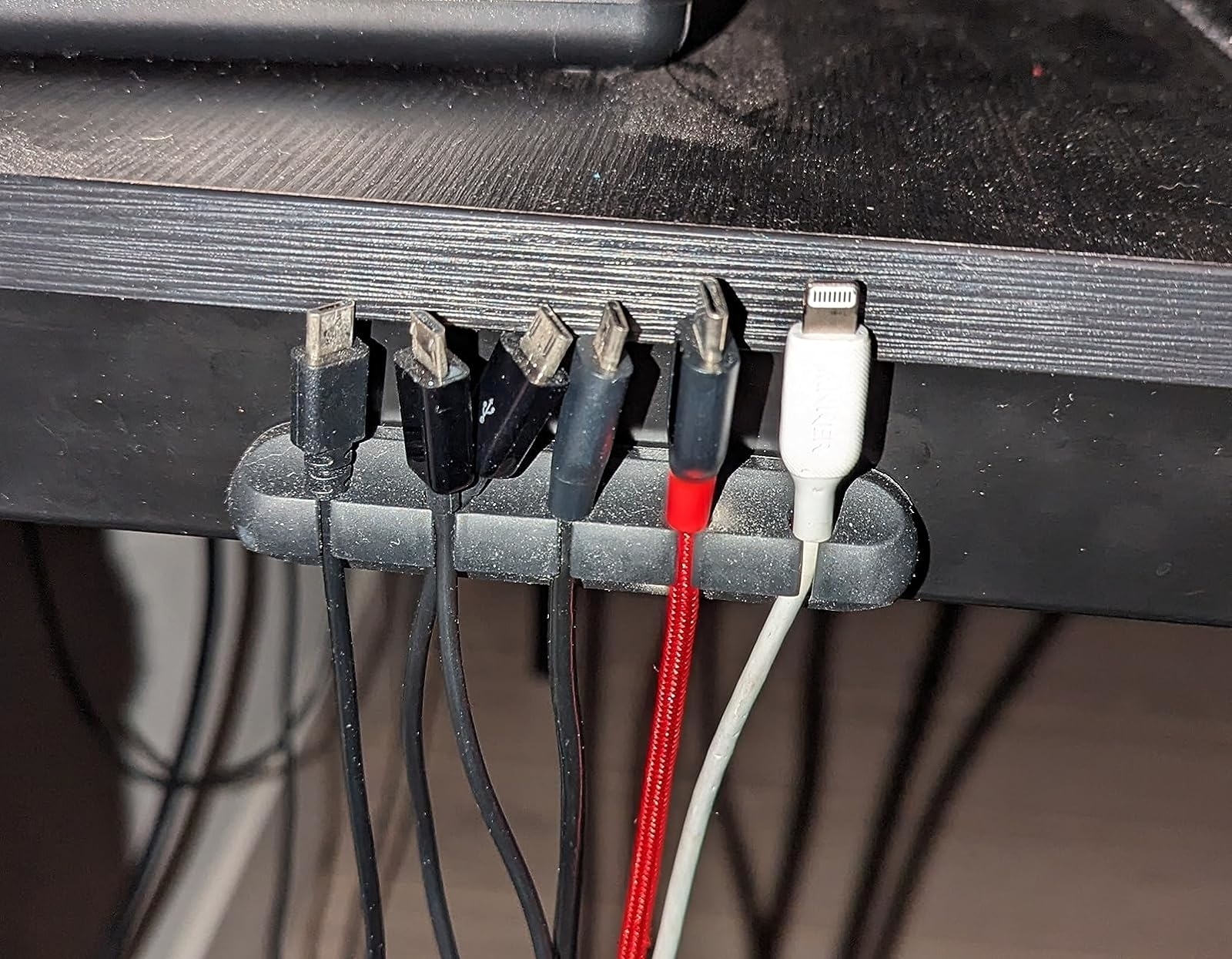 Reviewer image of multiple cables in the gray organizer