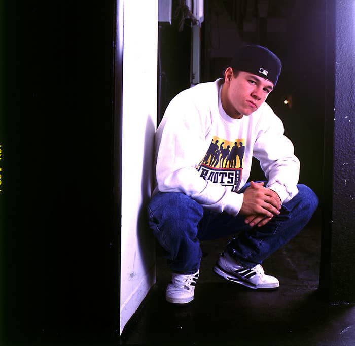 closeup of him as a teen crouched down