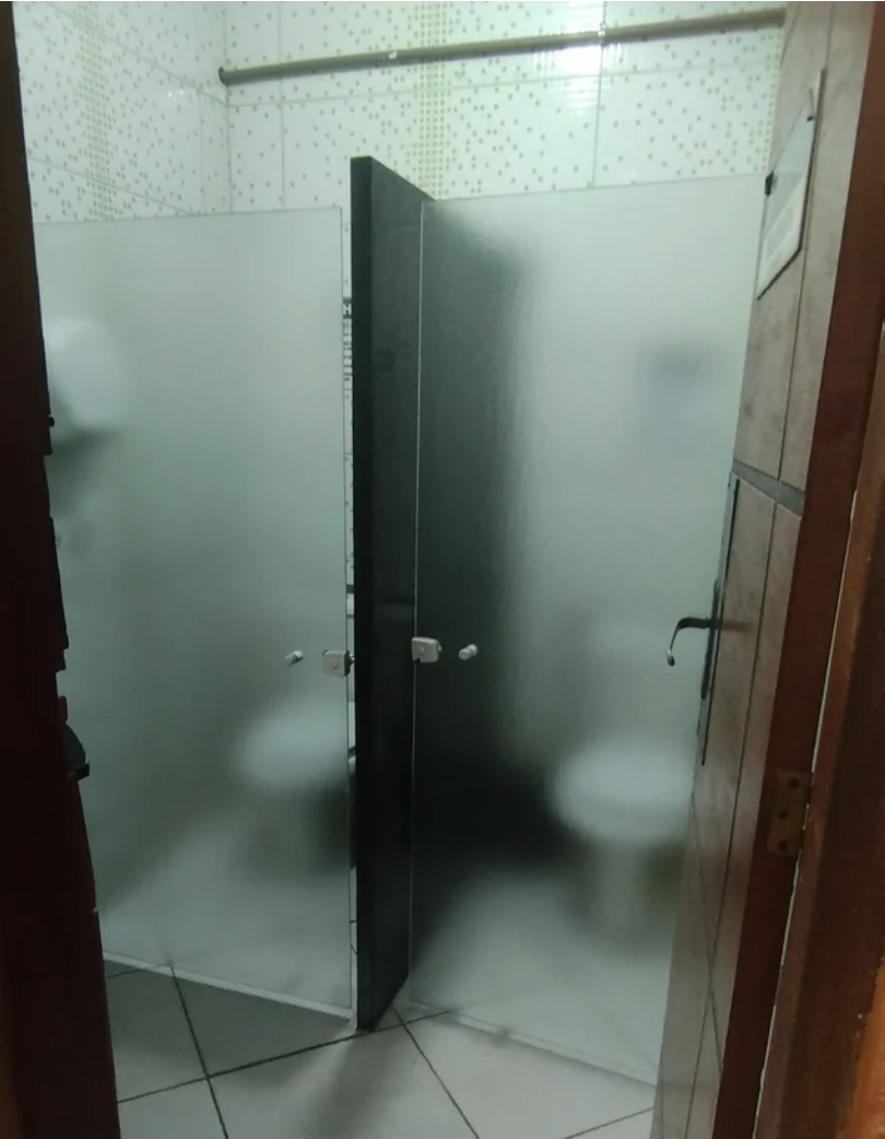Glass bathroom stall doors