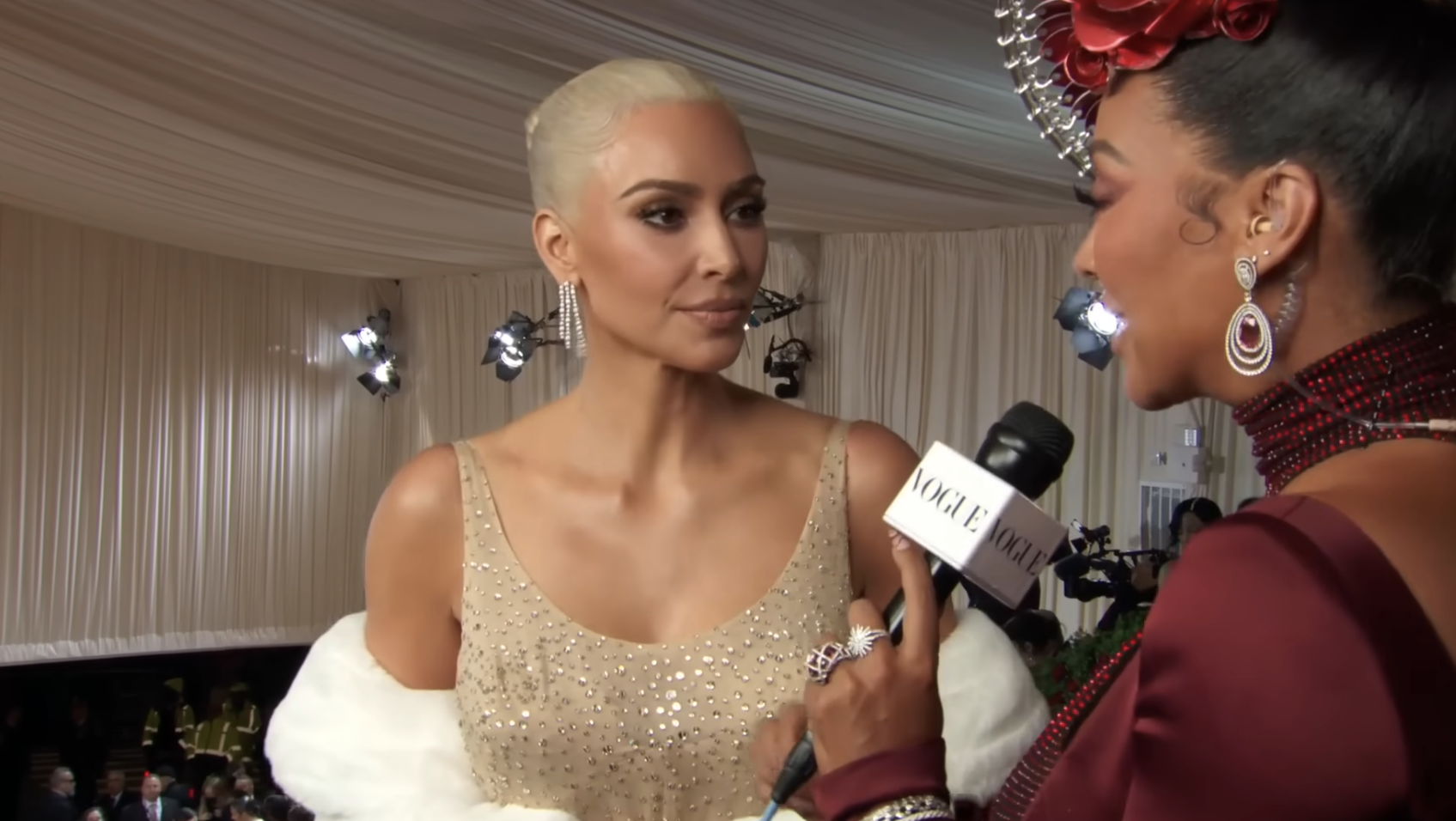 kim giving an interview at the met