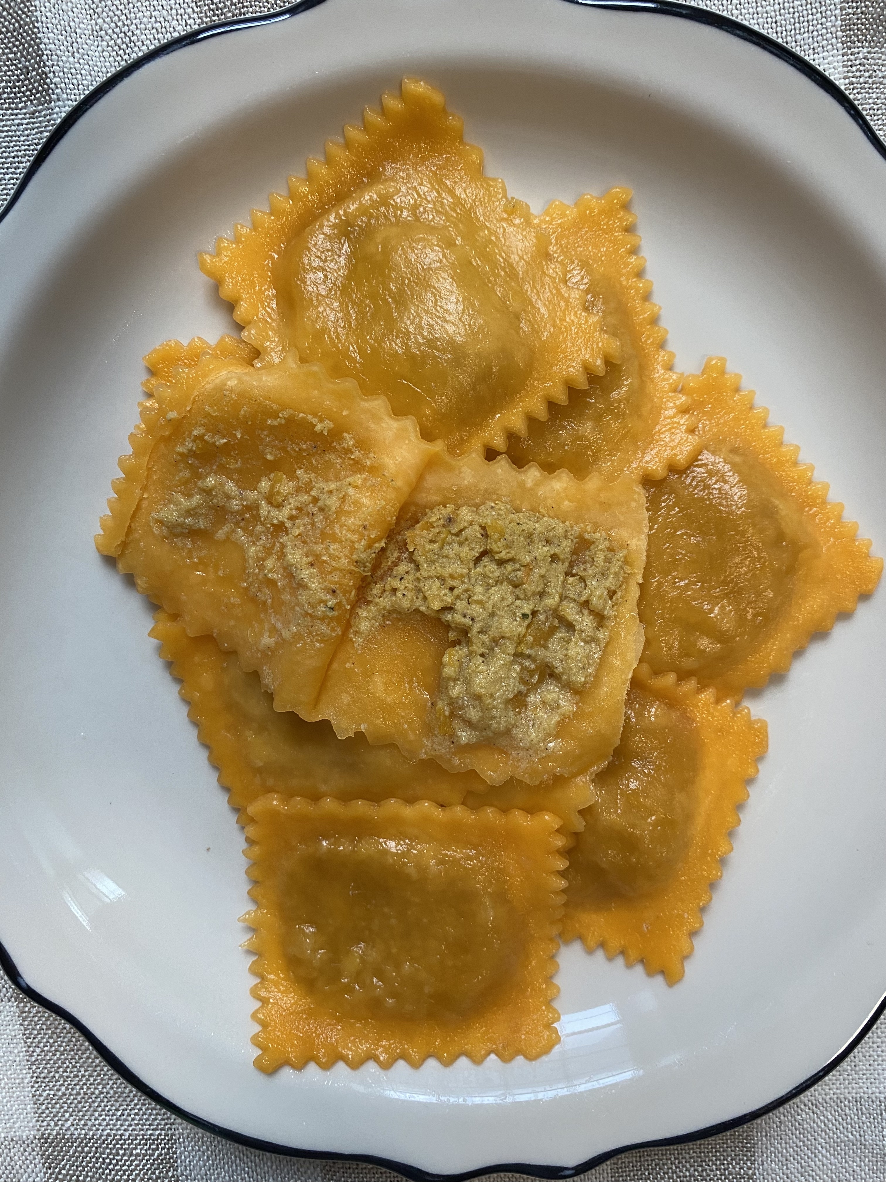 a close-up shot of the filling inside gluten free pumpkin ravioli