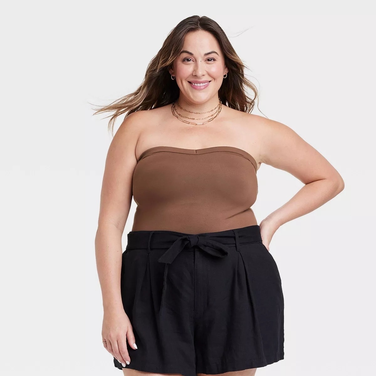 model wearing the brown tube top