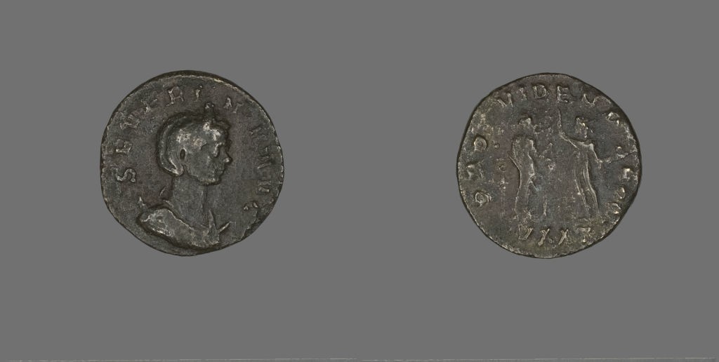 Two ancient coins with empress&#x27;s face