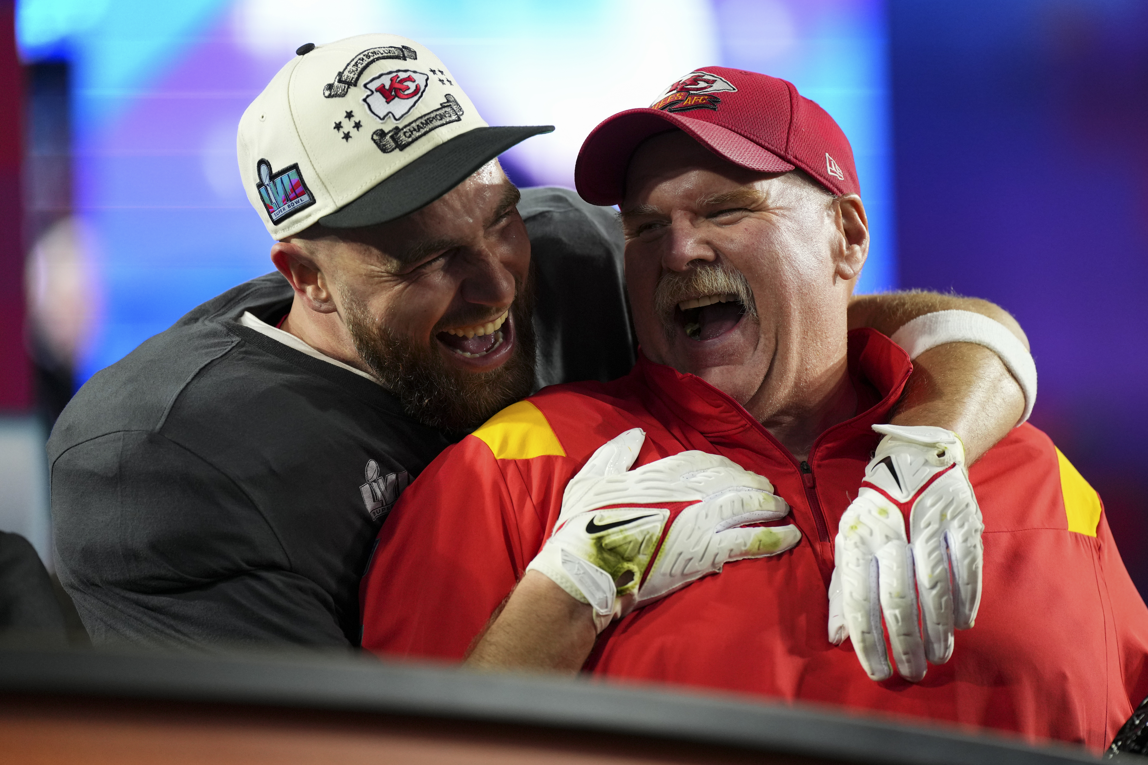 travis hugging his coach