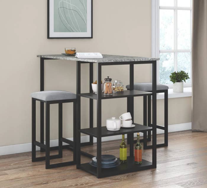 rectangle dining table with two stools and shelves