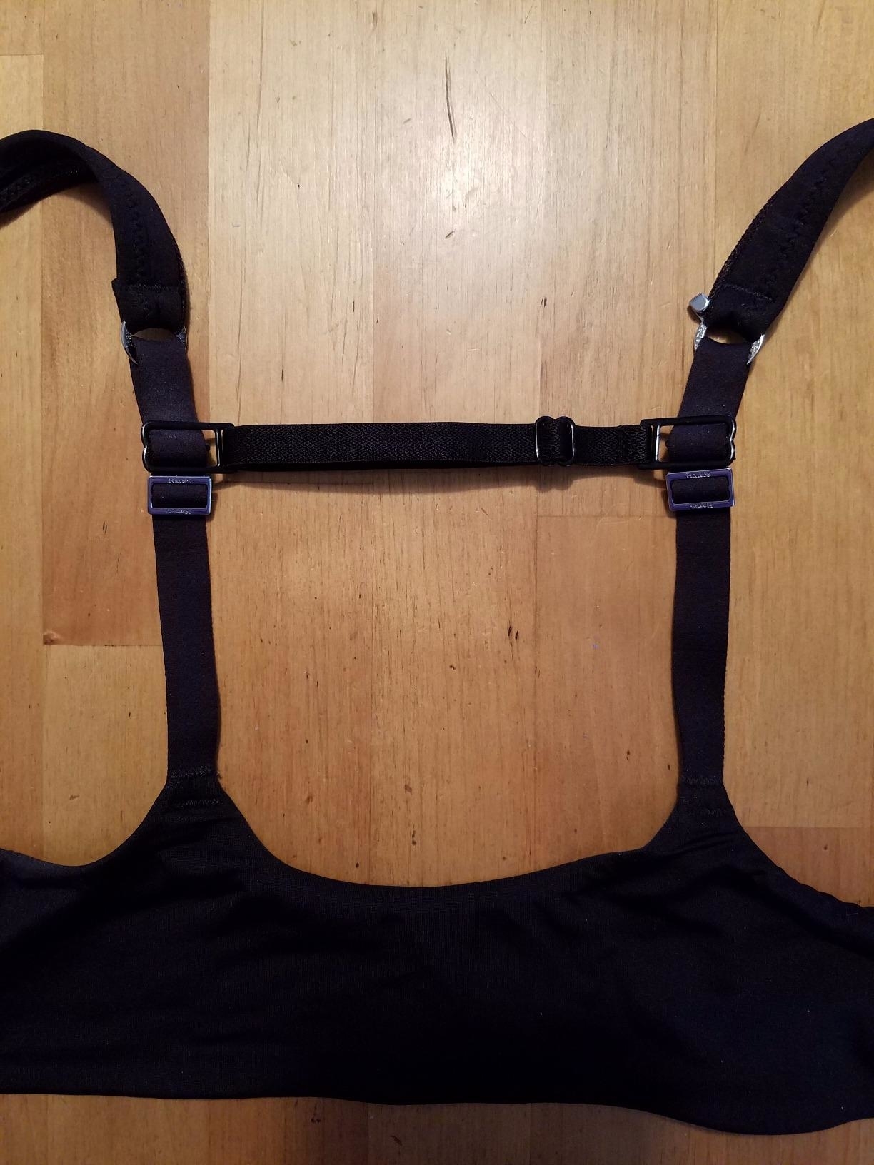Reviewer’s photo of a black bra with bra strap clip on it