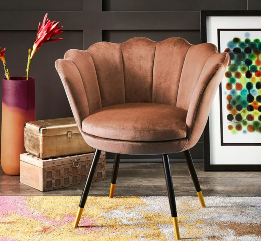 peach seashell frame chair with four legs