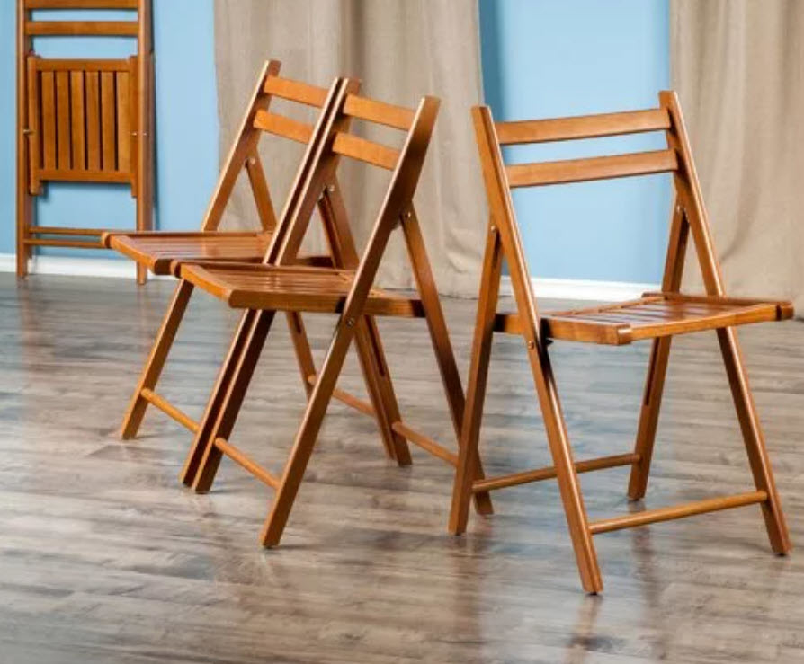 set of three glossy wood foldable chairs