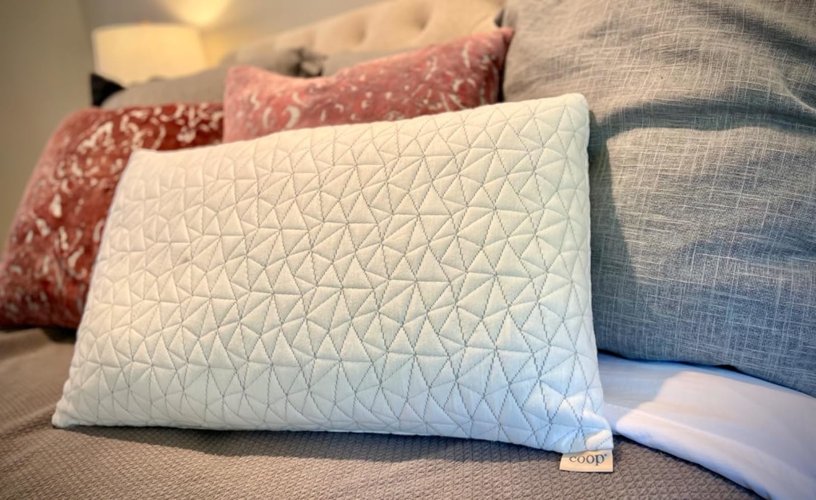 Reviewer image of the pillow on their bed