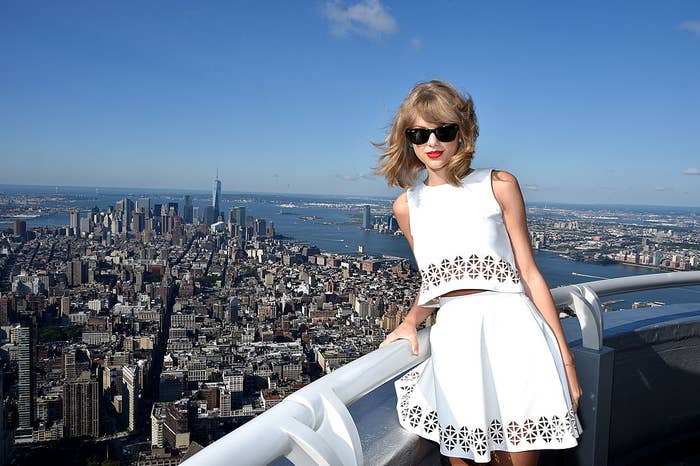 Taylor Swift atop the Empire State Building, overlooking NYC.