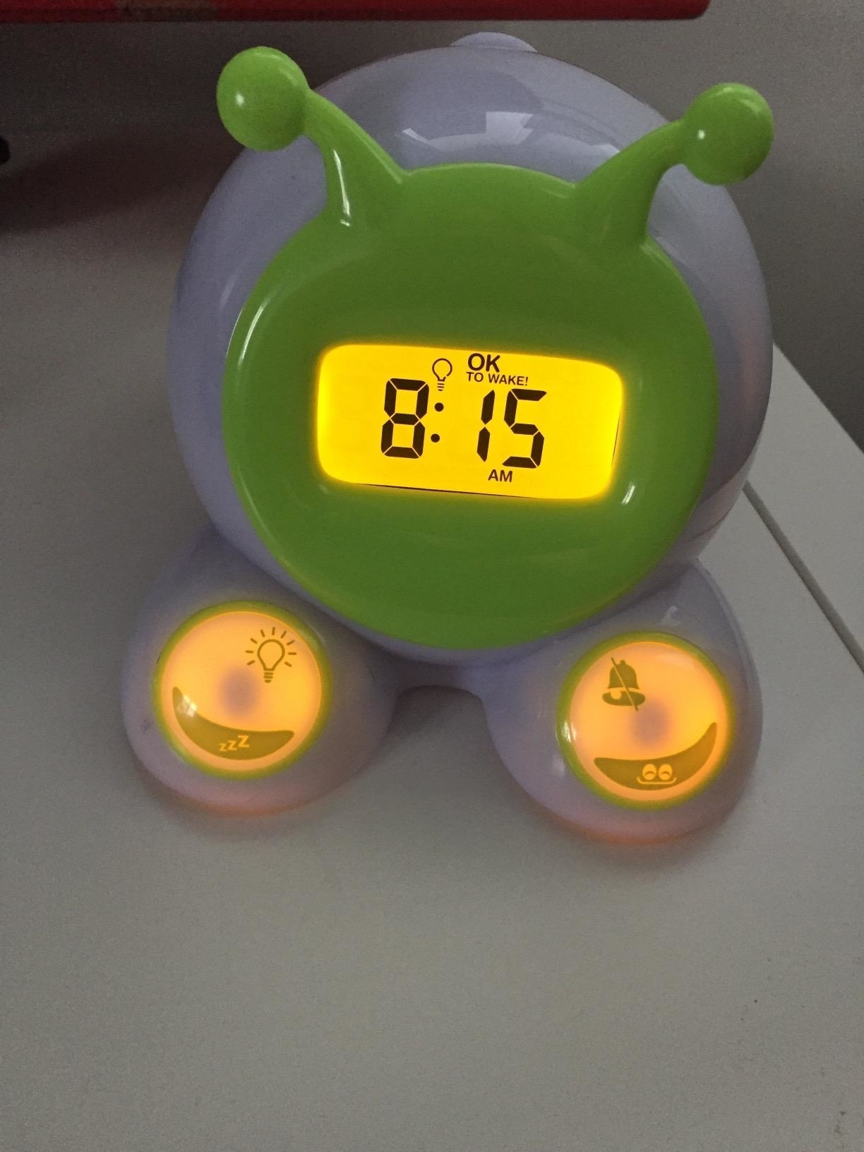 Reviewer image of the lit up alarm clock