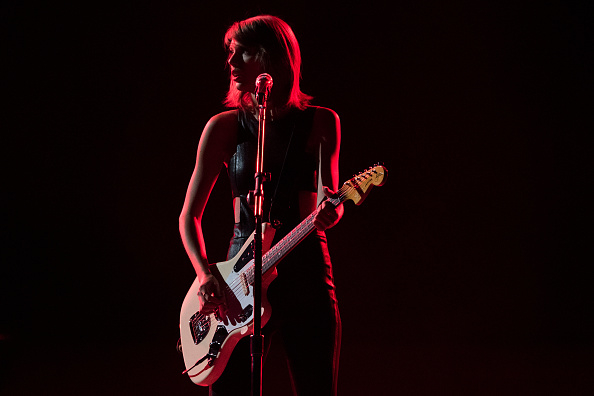 Taylor plays electric guitar onstage at the &quot;1989 World Tour&quot;