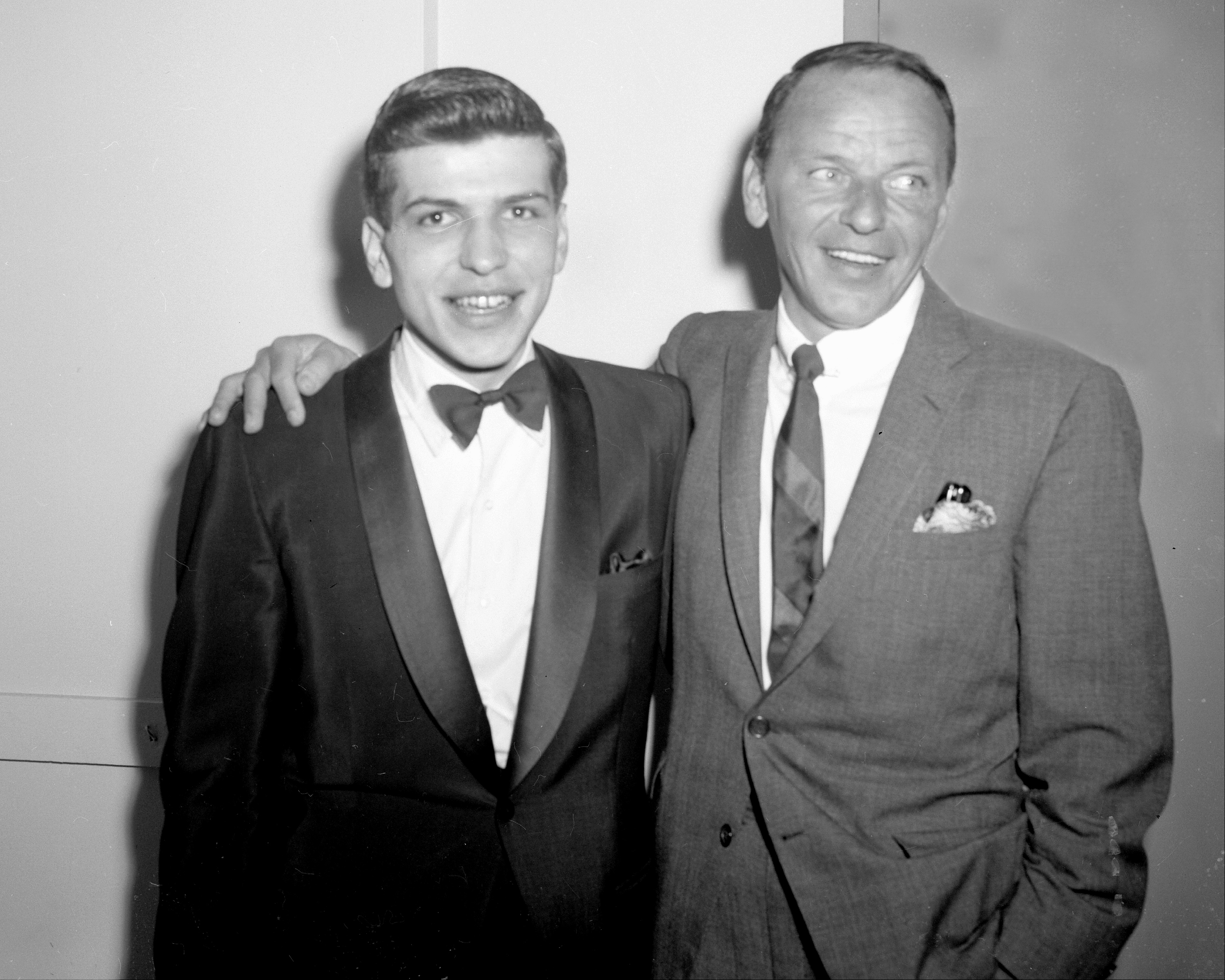 Frank Sinatra Jr posing with his dad
