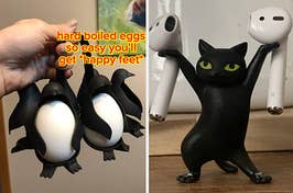 reviewer holding the egg holder made to look like penguins "hard boiled eggs so easy you'll get happy feet" / A reviewer's black cat figurine holding their Airpods