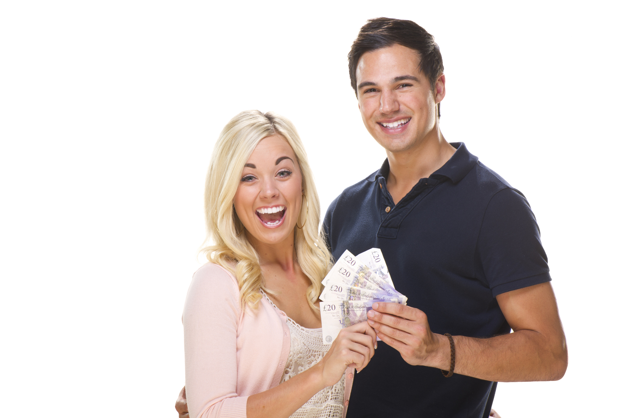 A couple smiling and holding money