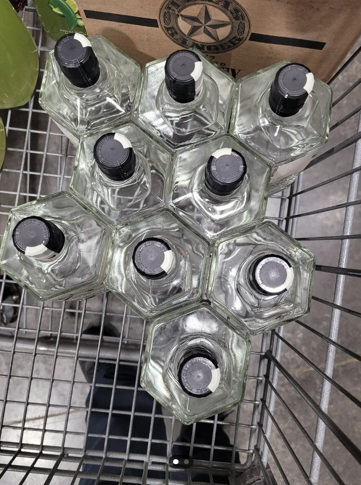 Bottles of gin in a grocery store basket