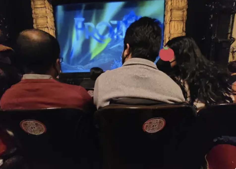 A tall man blocking someone's view