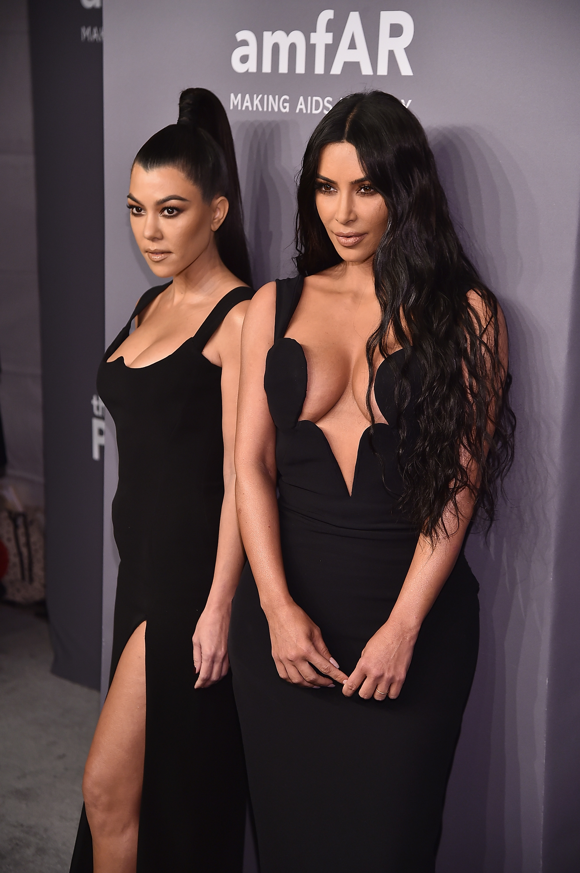 Kourtney and Kim at a media event