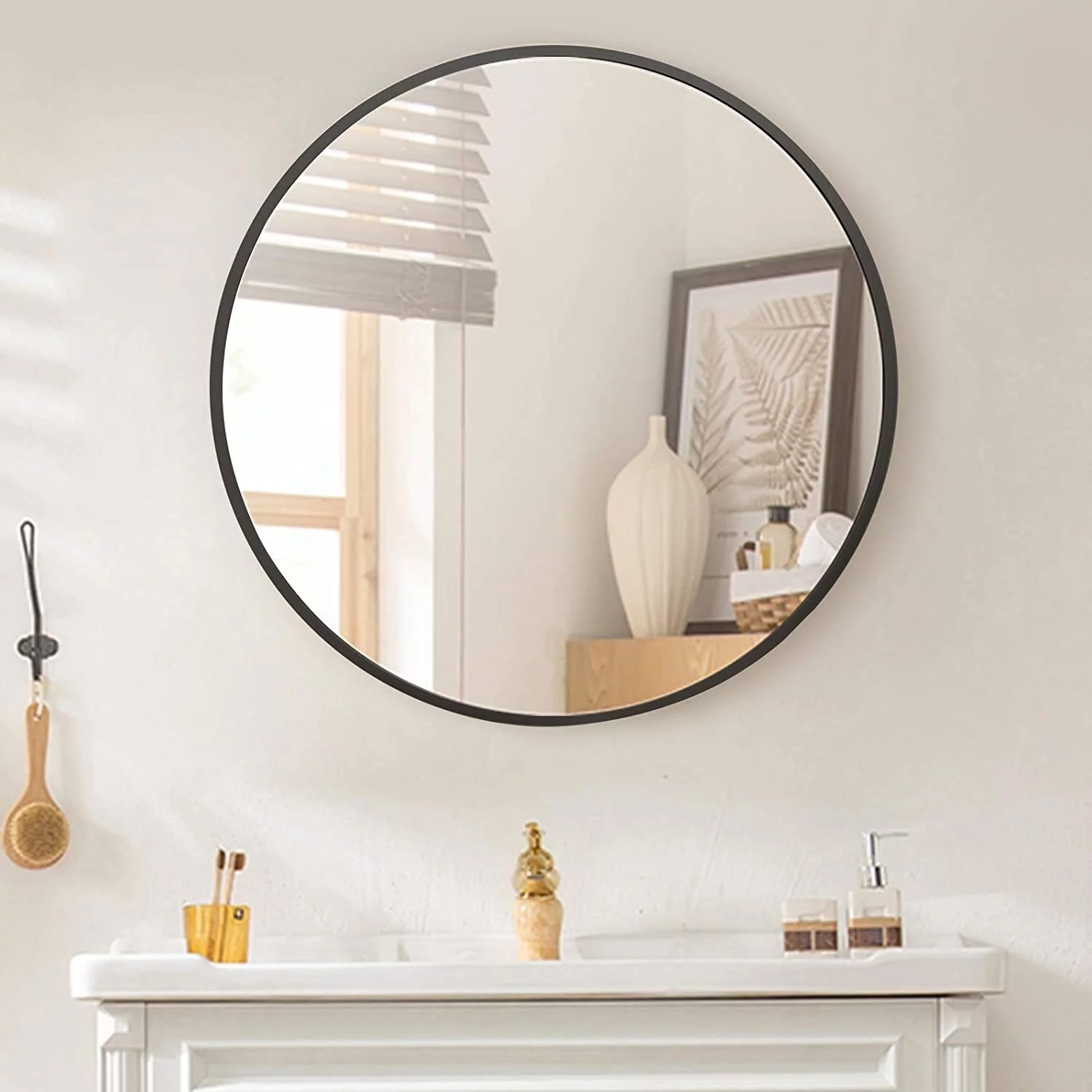 round wall mirror with black trim