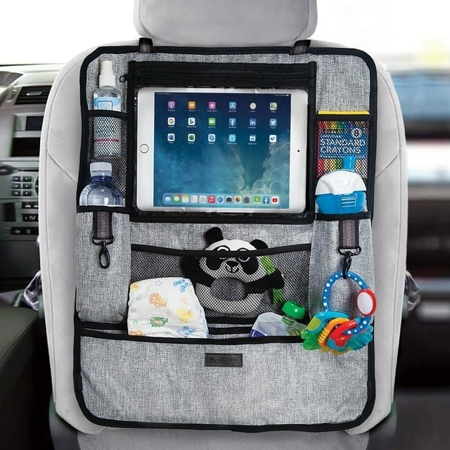 An organizer on the back of a car seat holds toys