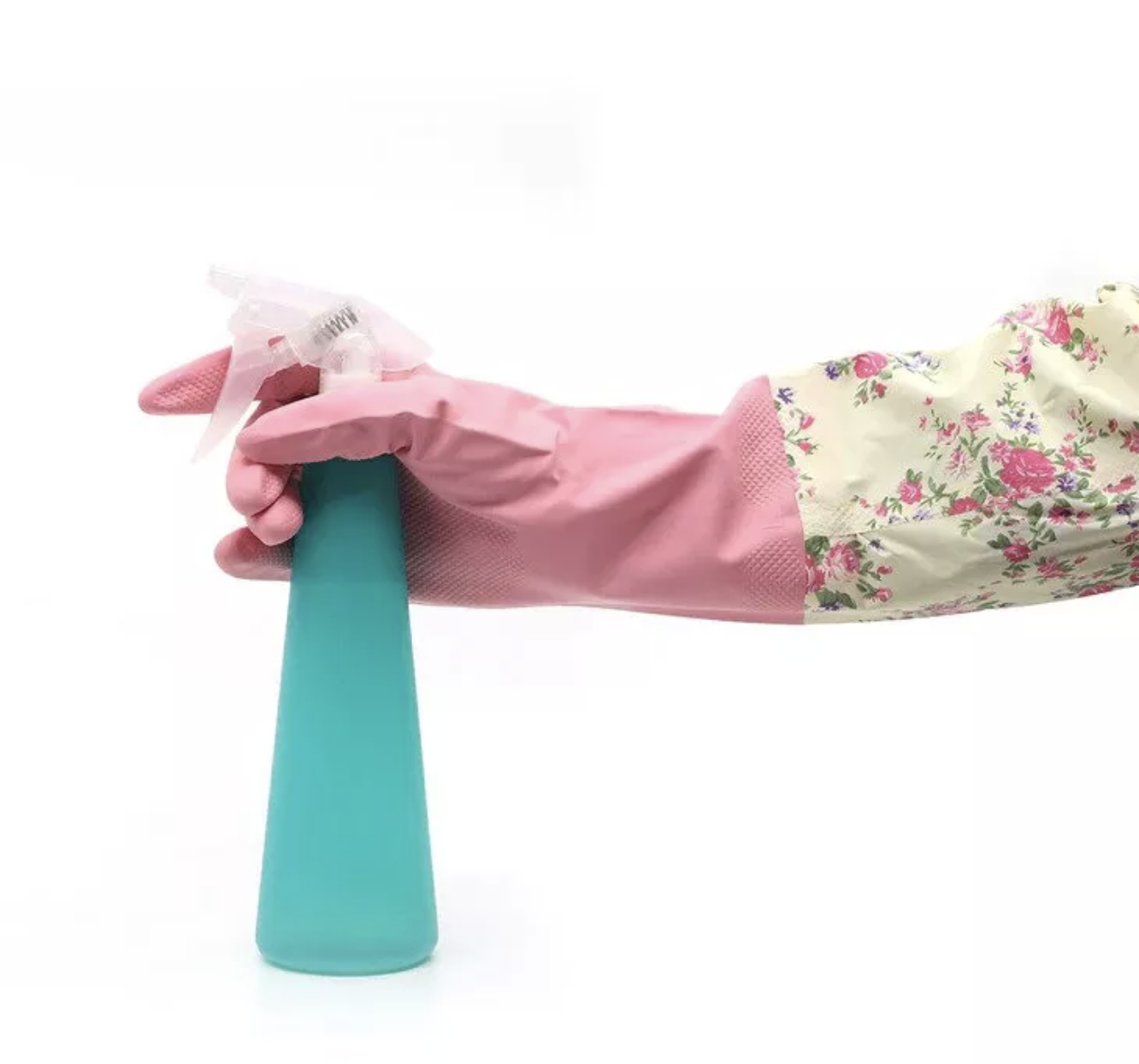 a hand holding a squirt bottle wearing long pink beige and floral cleaning gloves