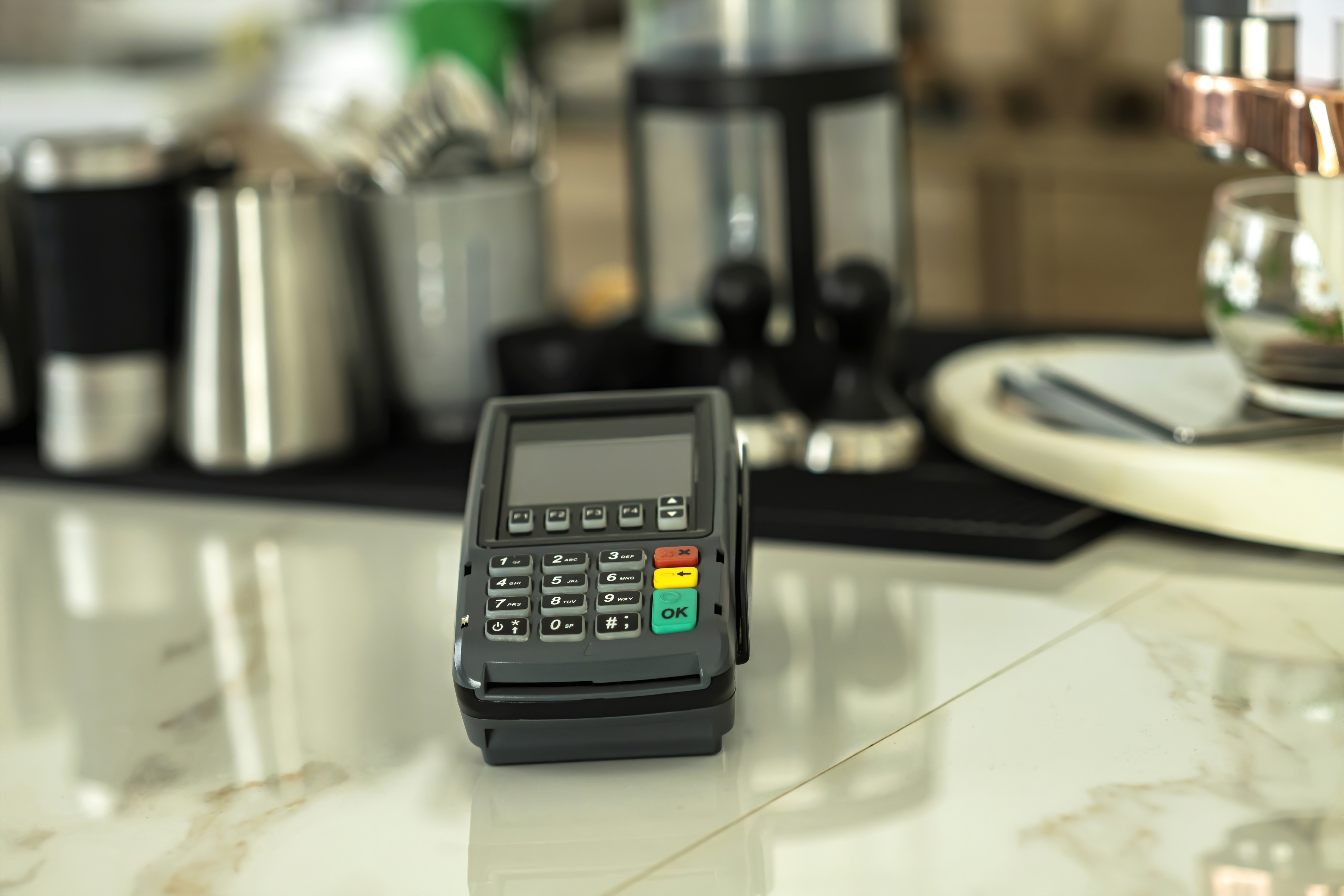 pay terminal on restaurant counter