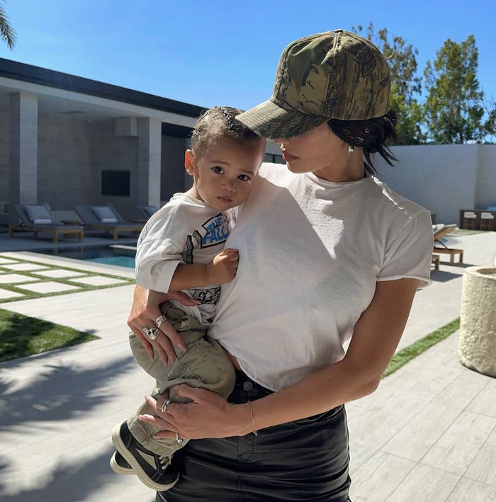 kylie holding her son