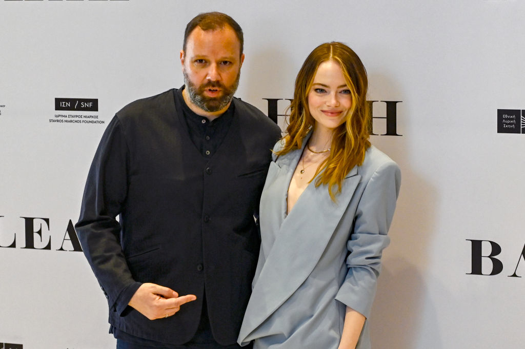 Closeup of Yorgos Lanthimos and Emma Stone on the red carpet