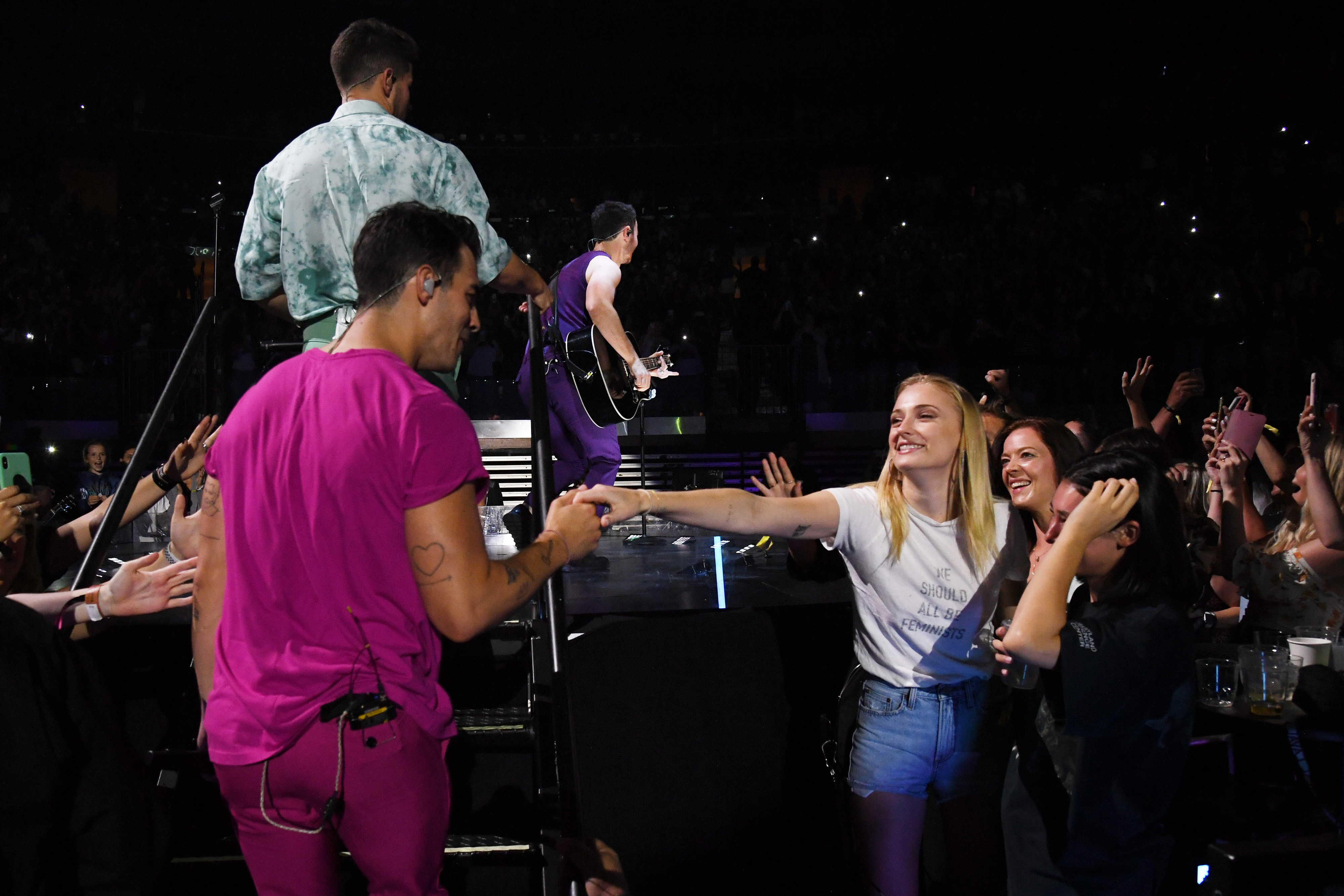 joe greeting fans at a concert