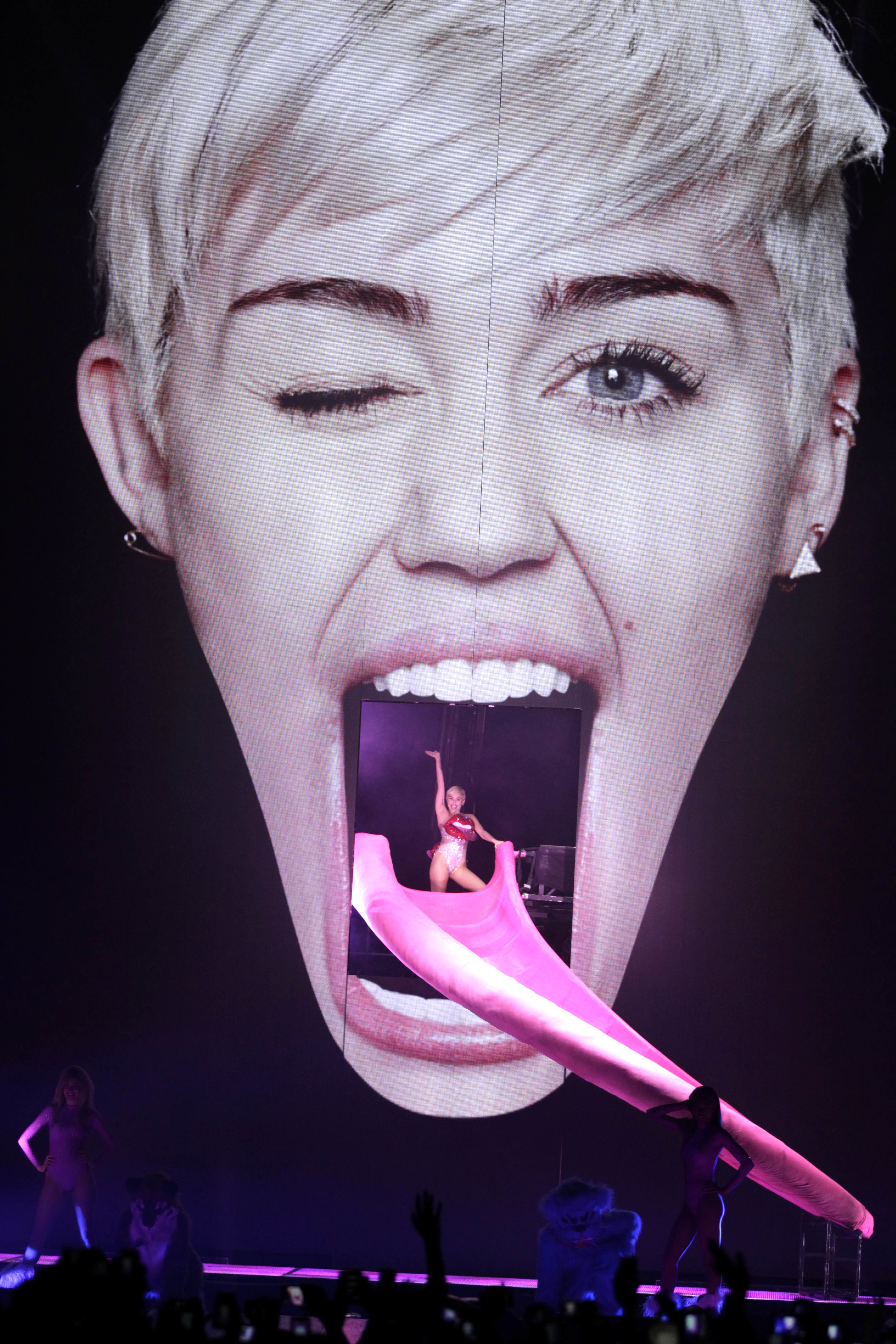 miley at the top of her tongue slide