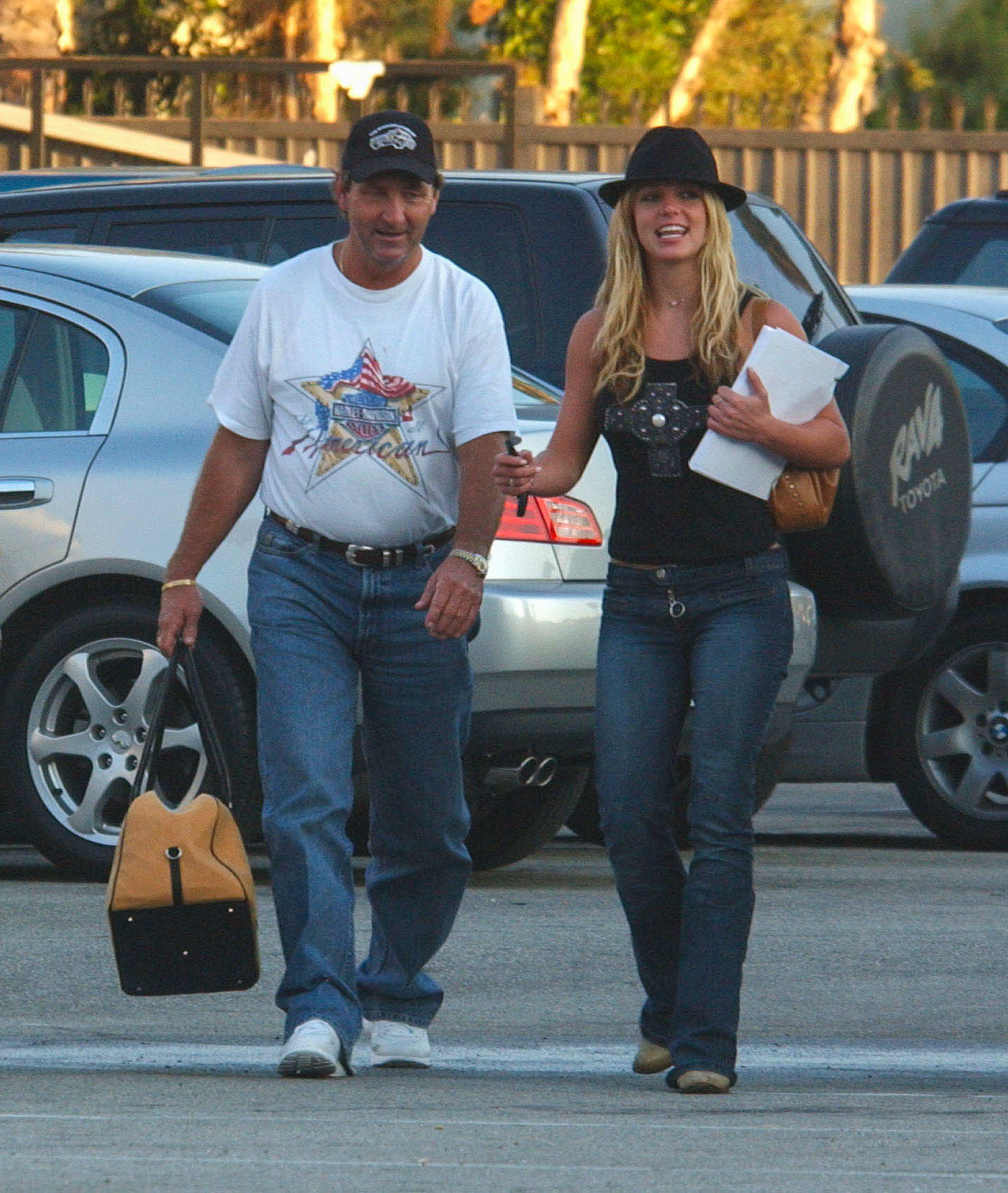 old photo of jamie and britney walking from the parking lot