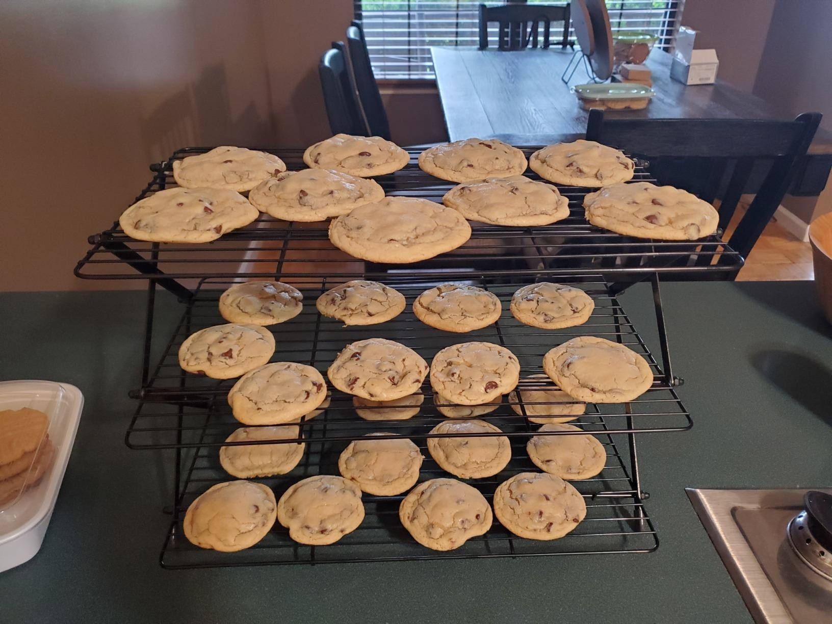 reviewer image of the cooling rack with cookies on the three tiers