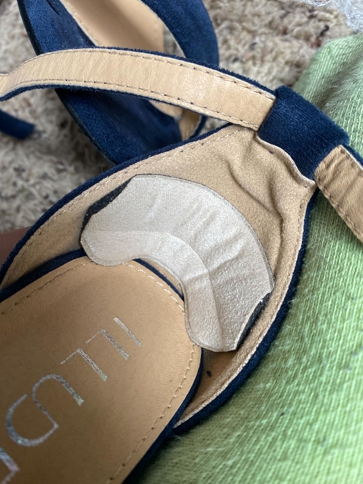 Reviewer image of heel cushion inside their shoe