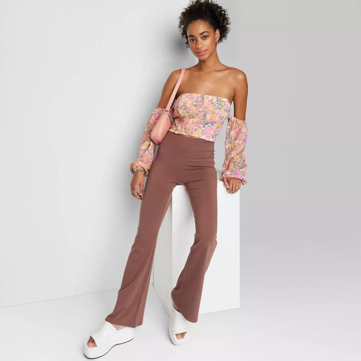 flared leggings with wide waistband on model