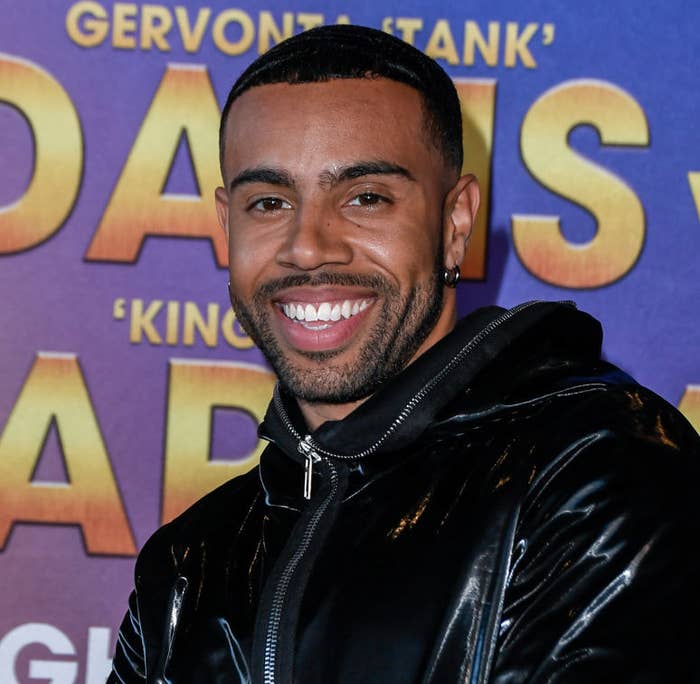 A closeup of Vic Mensa smiling