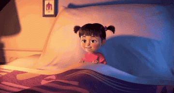 Boo from Monsters Inc. laughing then immediately falling asleep