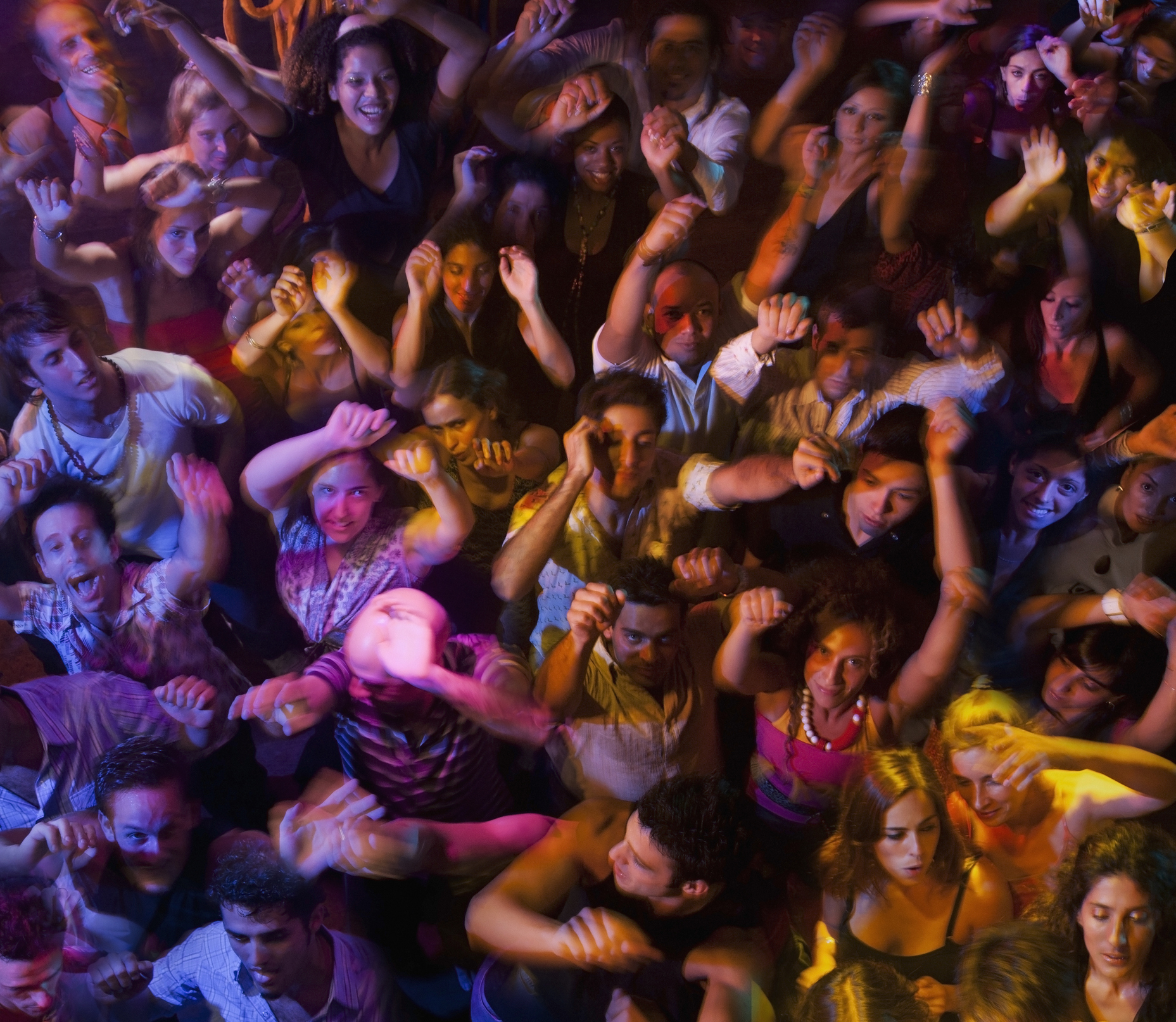 people in a crowd dancing