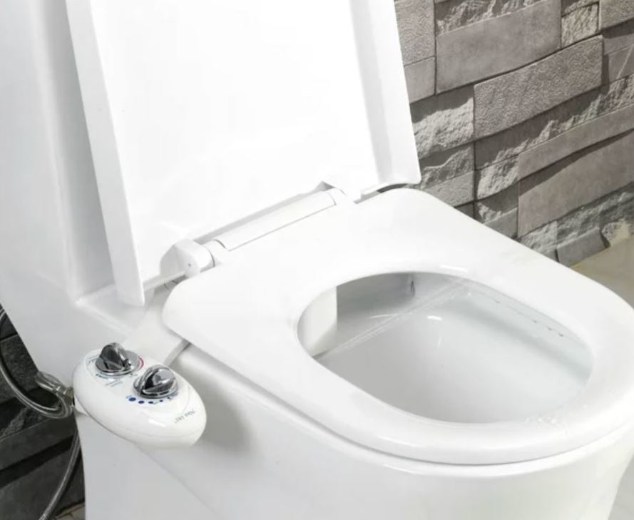 bidet attachment to a white toilet