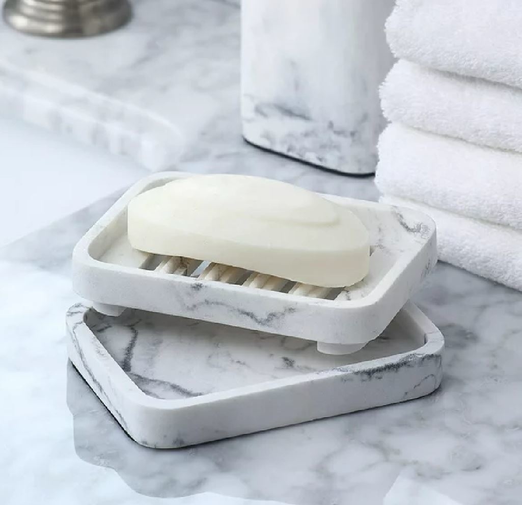 two marble soap dishes