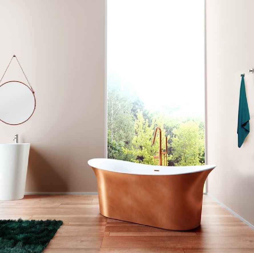 copper free-standing bathtub with window-view of trees