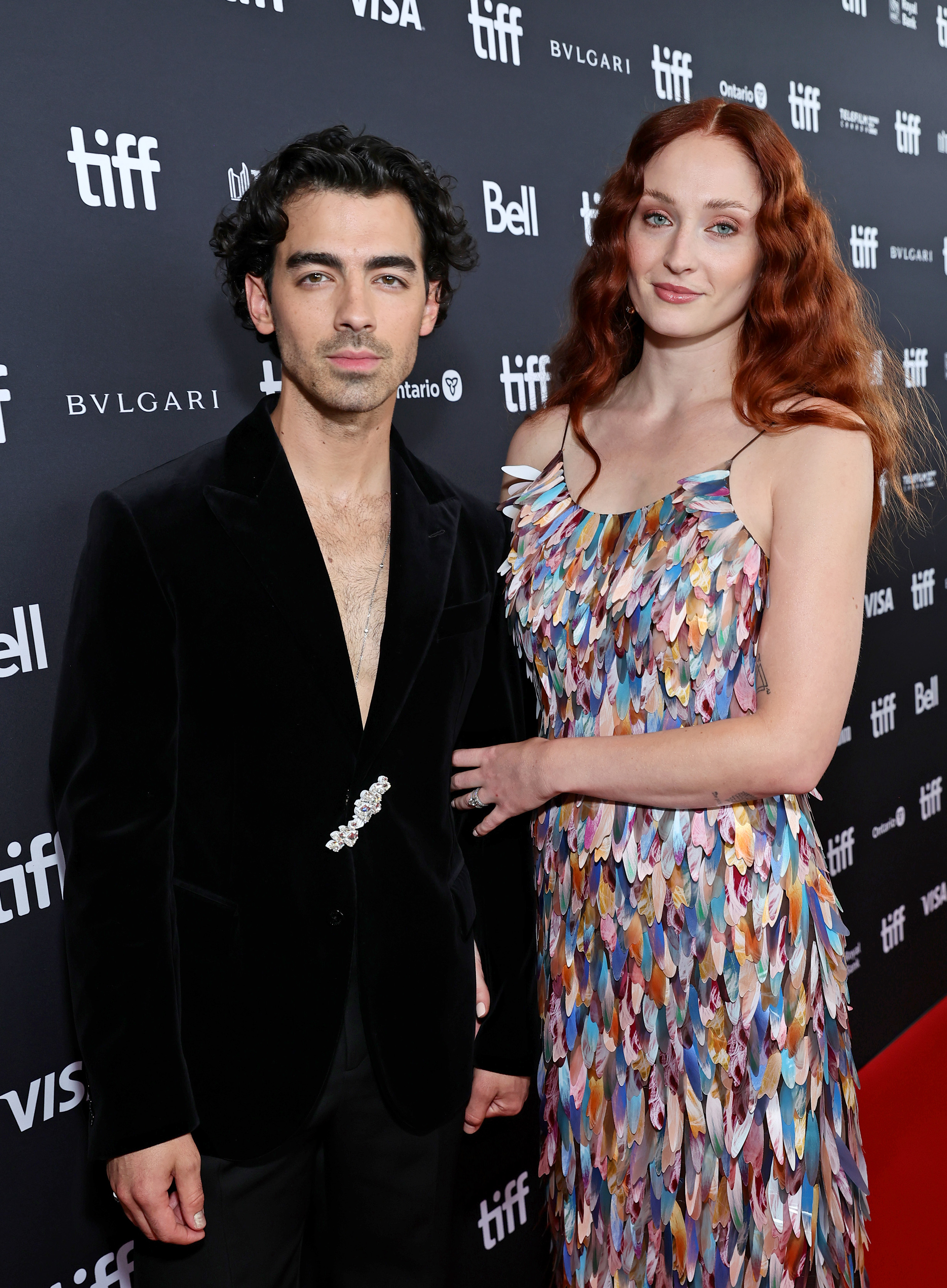 A closeup of the couple on the red carpet