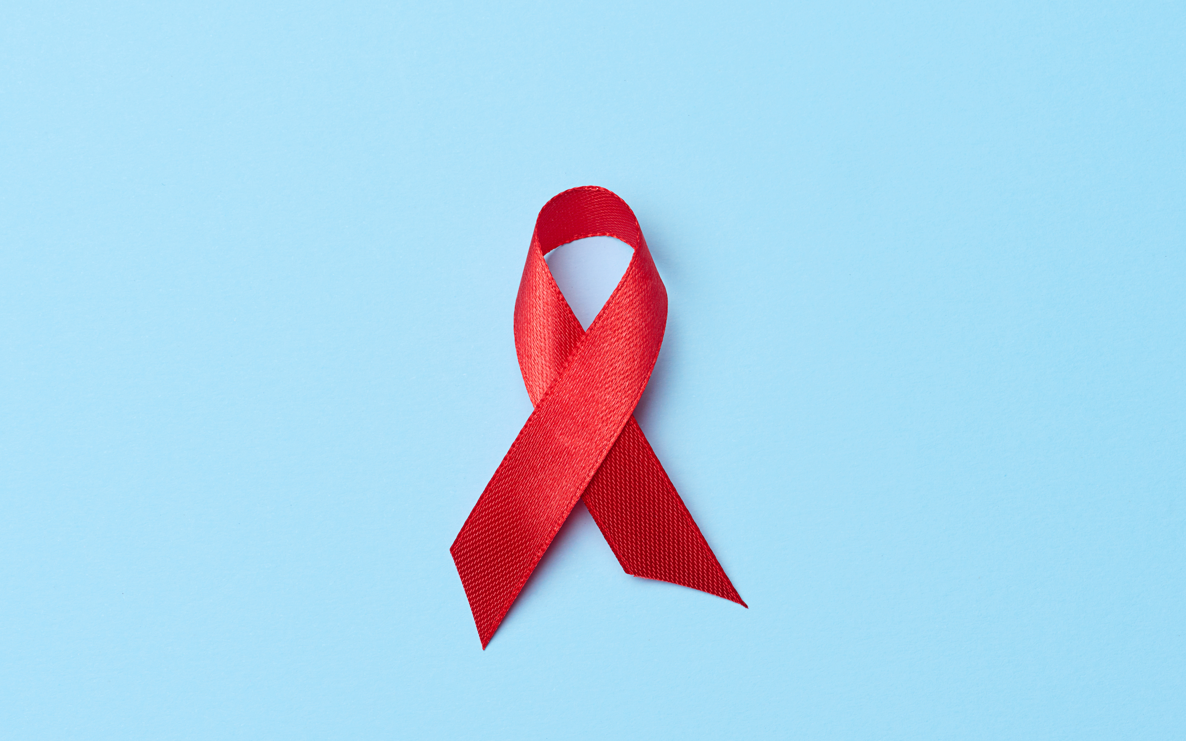 A red ribbon that symbolizes the fight against AIDS